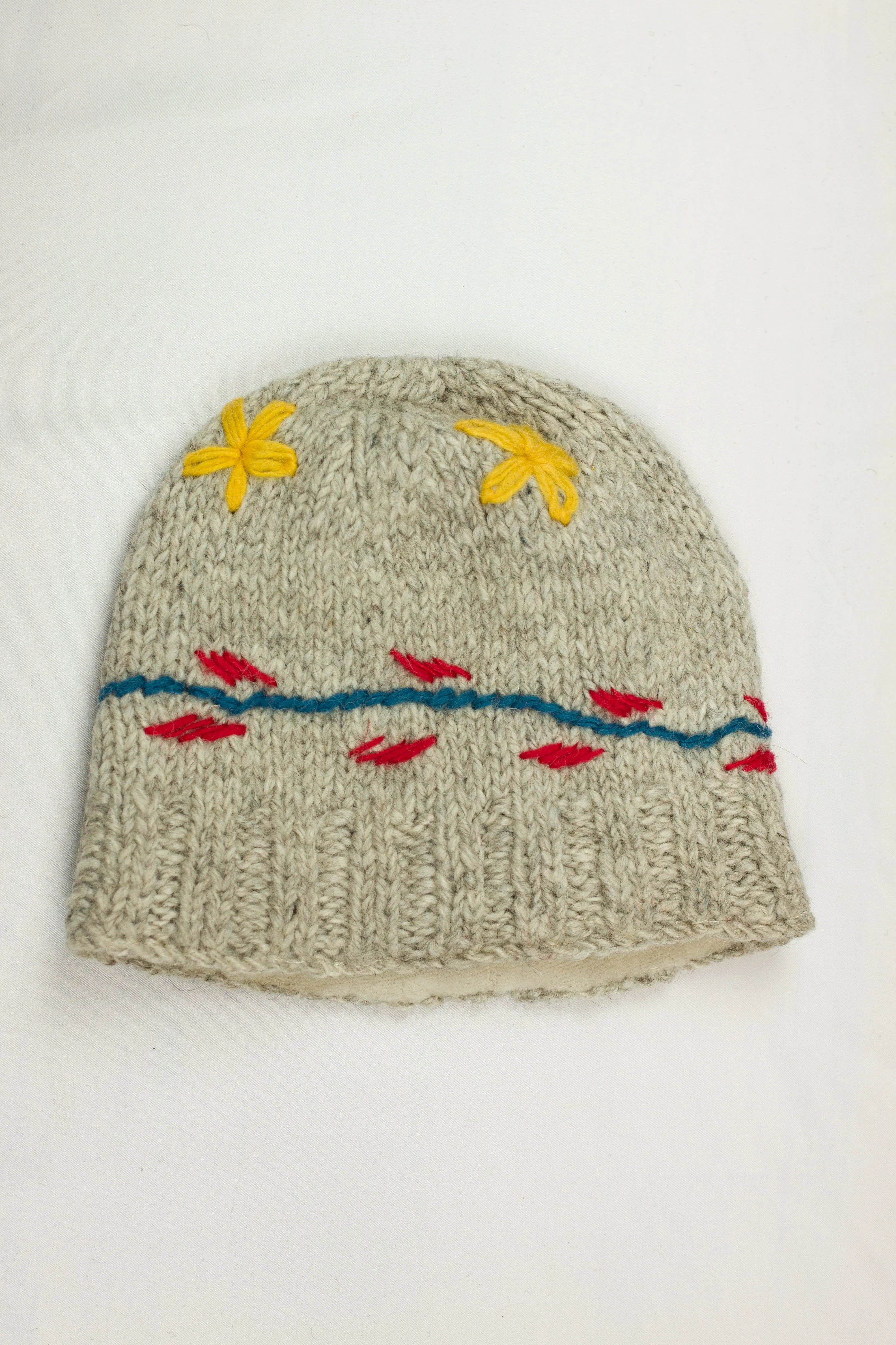 Hand knitted woolen beanie with soft fleece liner - unisex