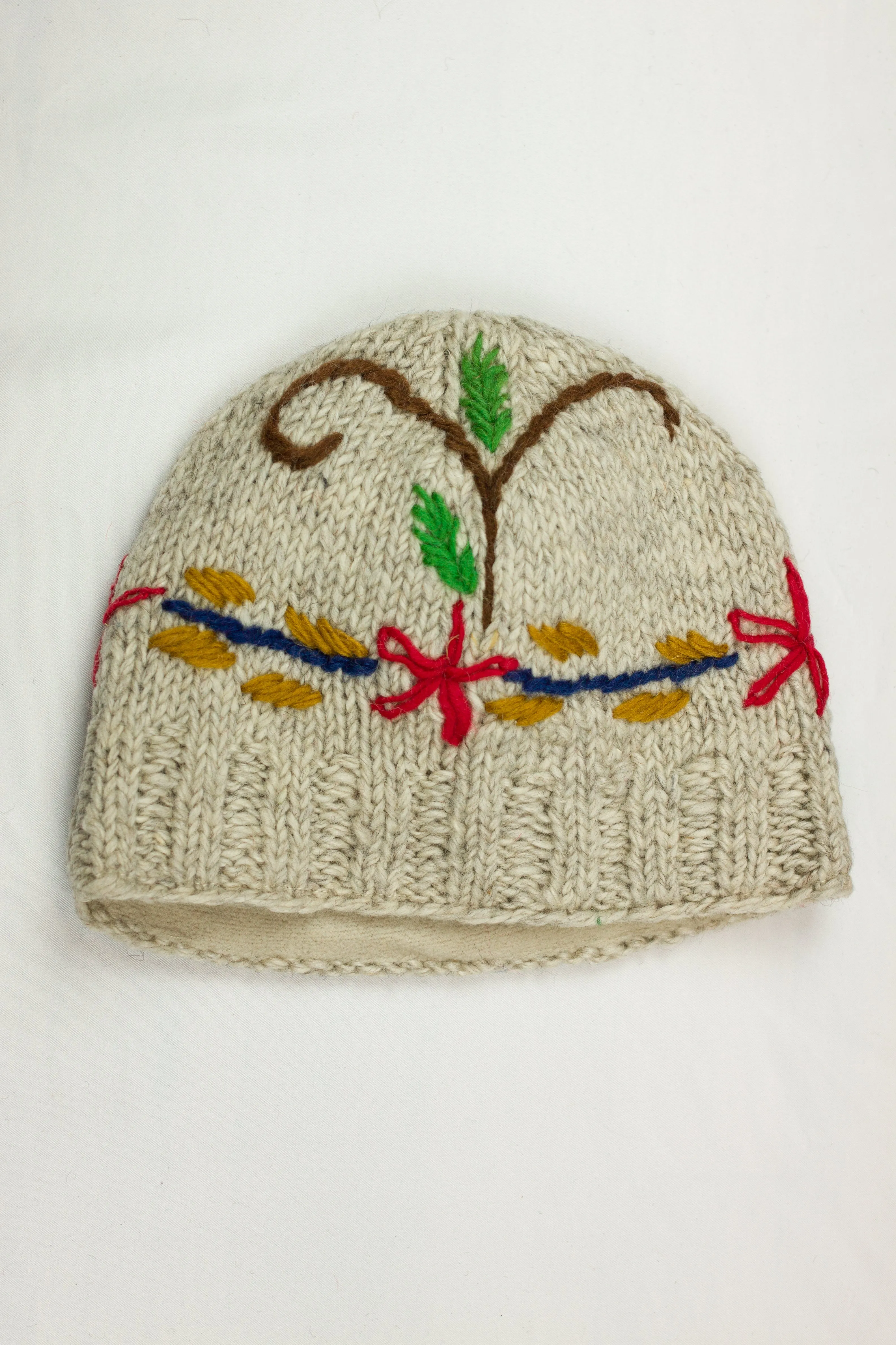 Hand knitted woolen beanie with soft fleece liner - unisex