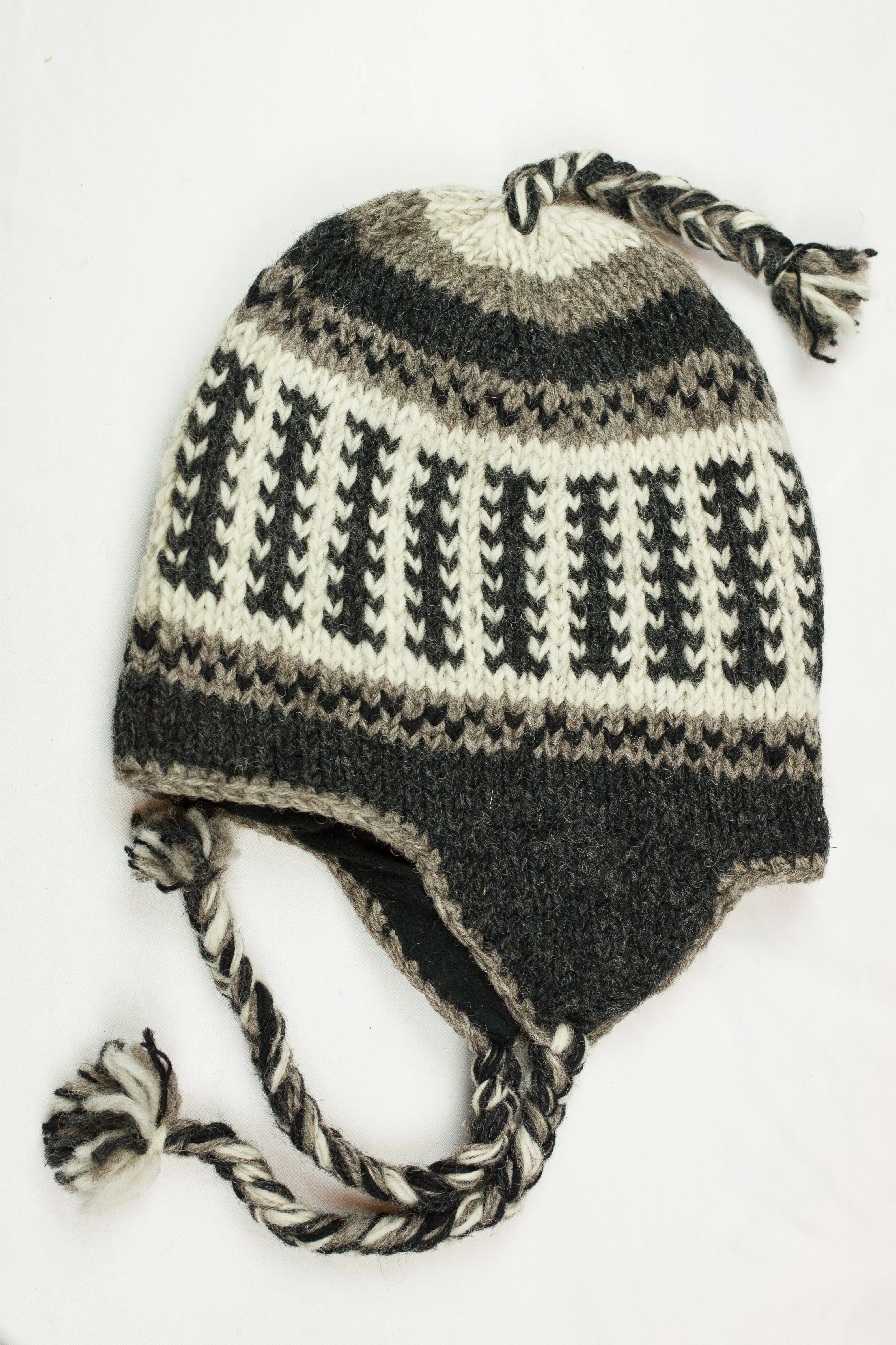 Hand knitted woolen Hat with soft fleece lining and ear flab - unisex