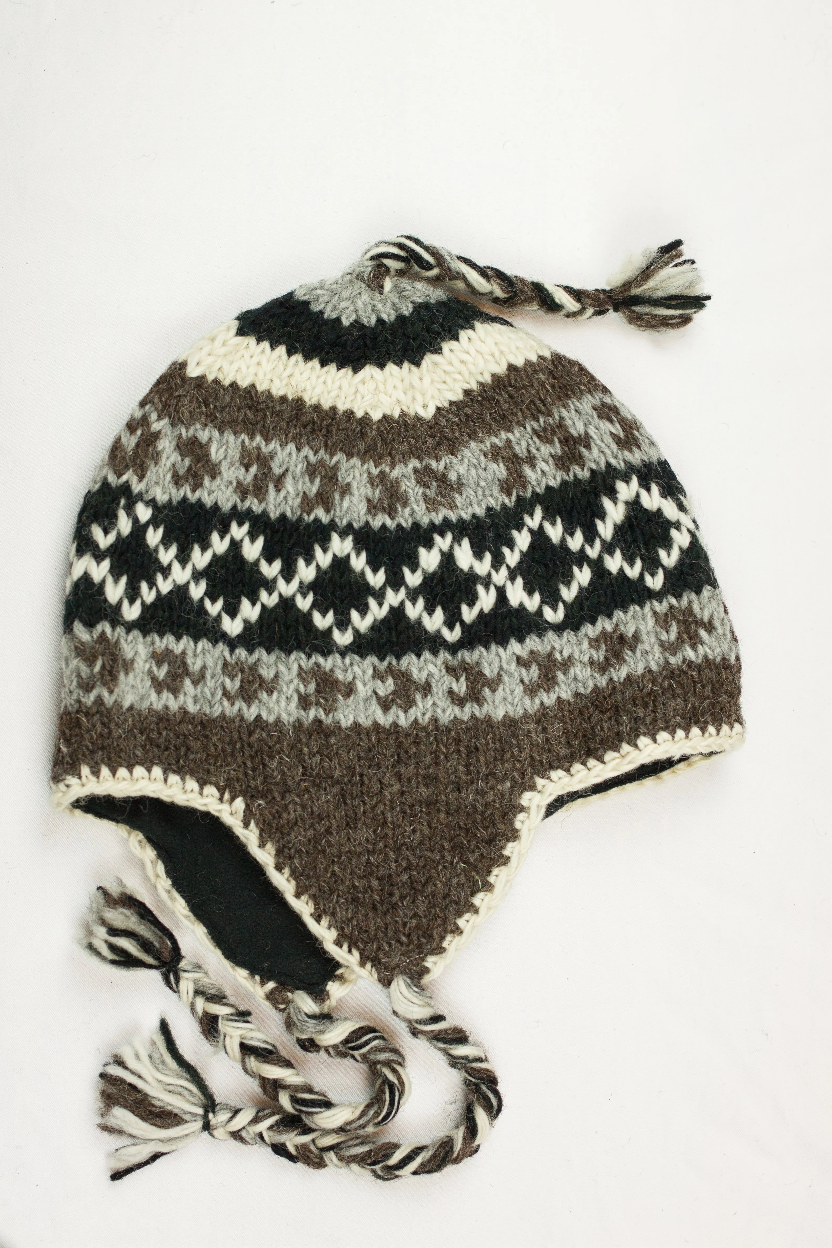 Hand knitted woolen Hat with soft fleece lining and ear flab - unisex