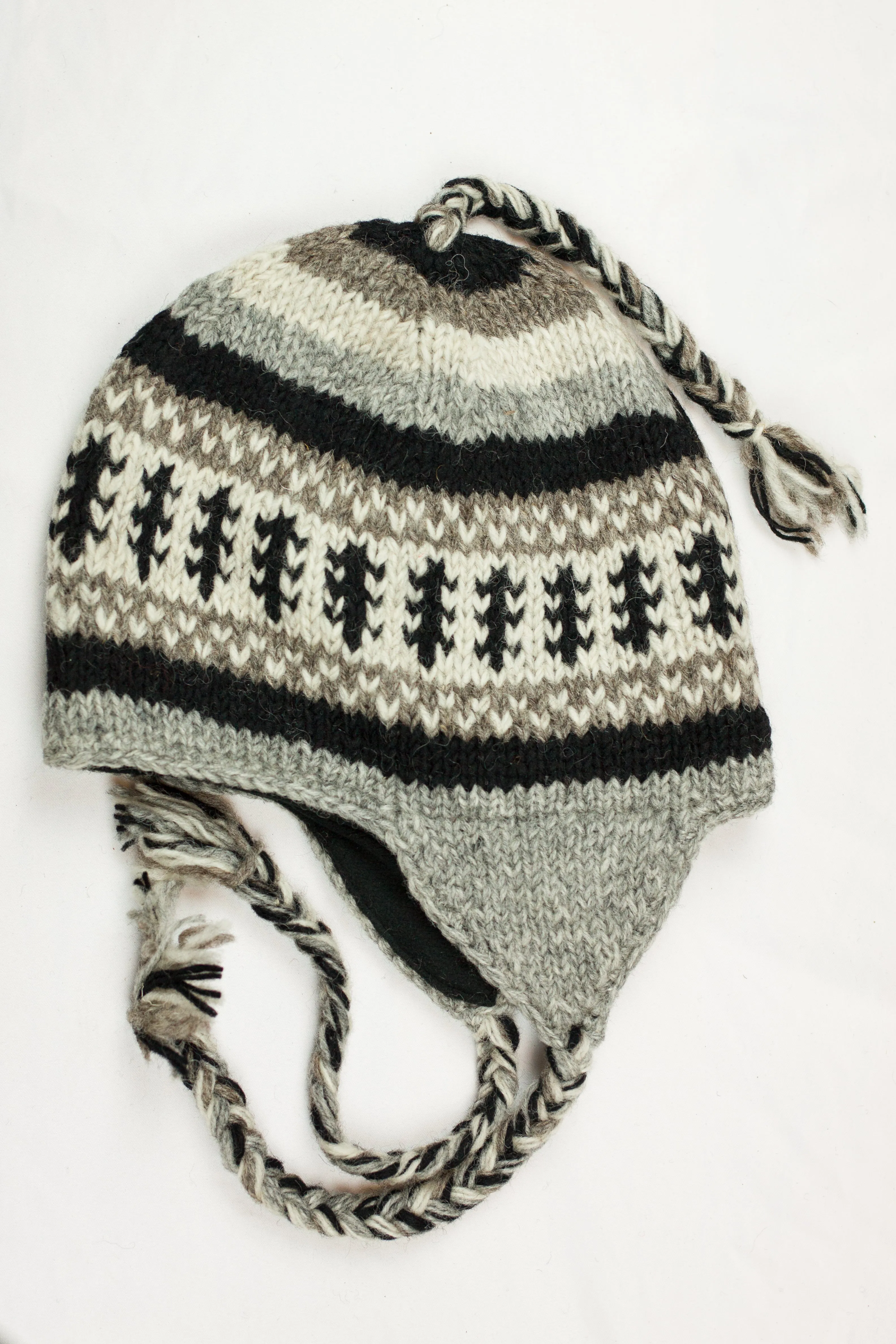 Hand knitted woolen Hat with soft fleece lining and ear flab - unisex