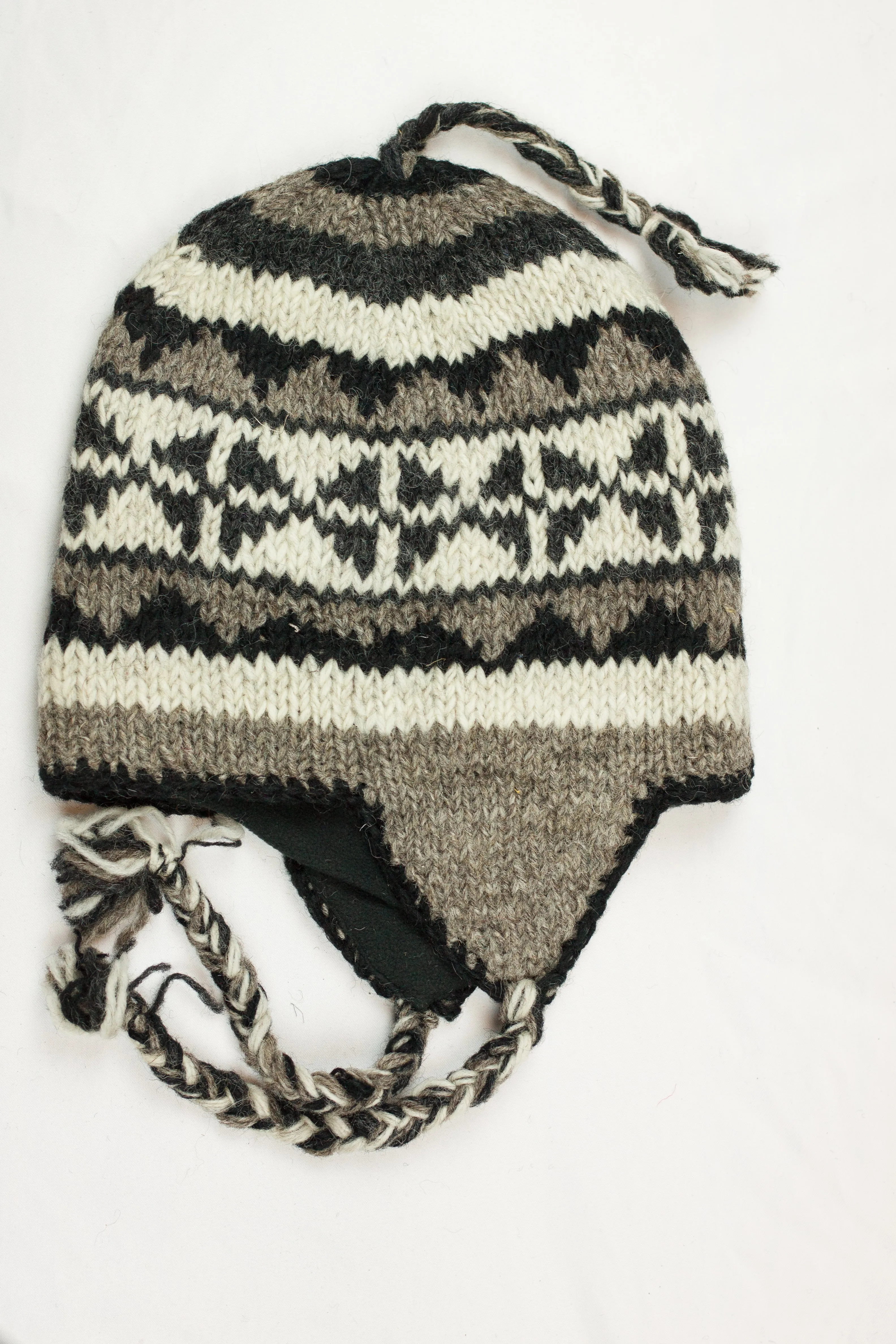 Hand knitted woolen Hat with soft fleece lining and ear flab - unisex
