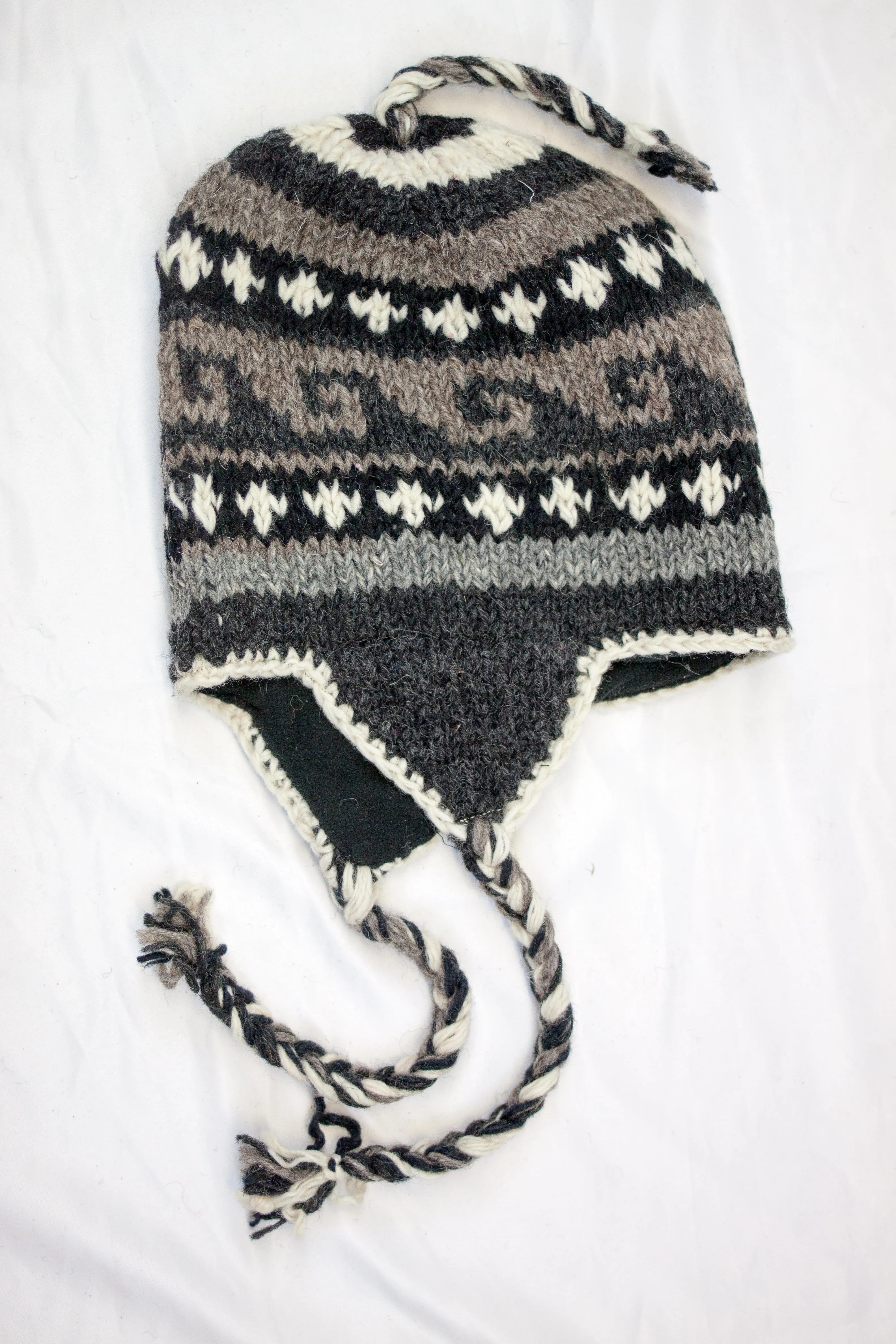 Hand knitted woolen Hat with soft fleece lining and ear flab - unisex