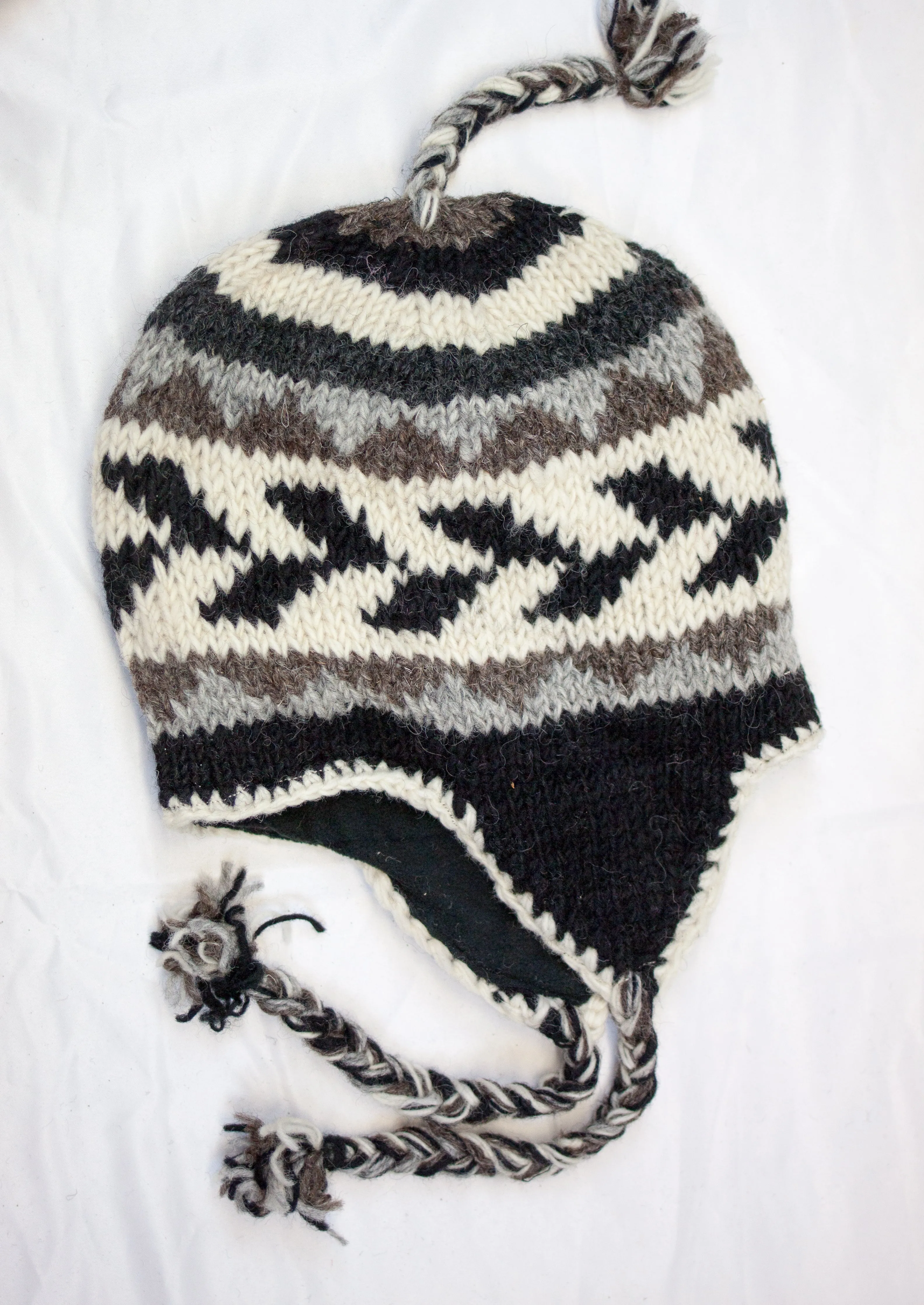 Hand knitted woolen Hat with soft fleece lining and ear flab - unisex
