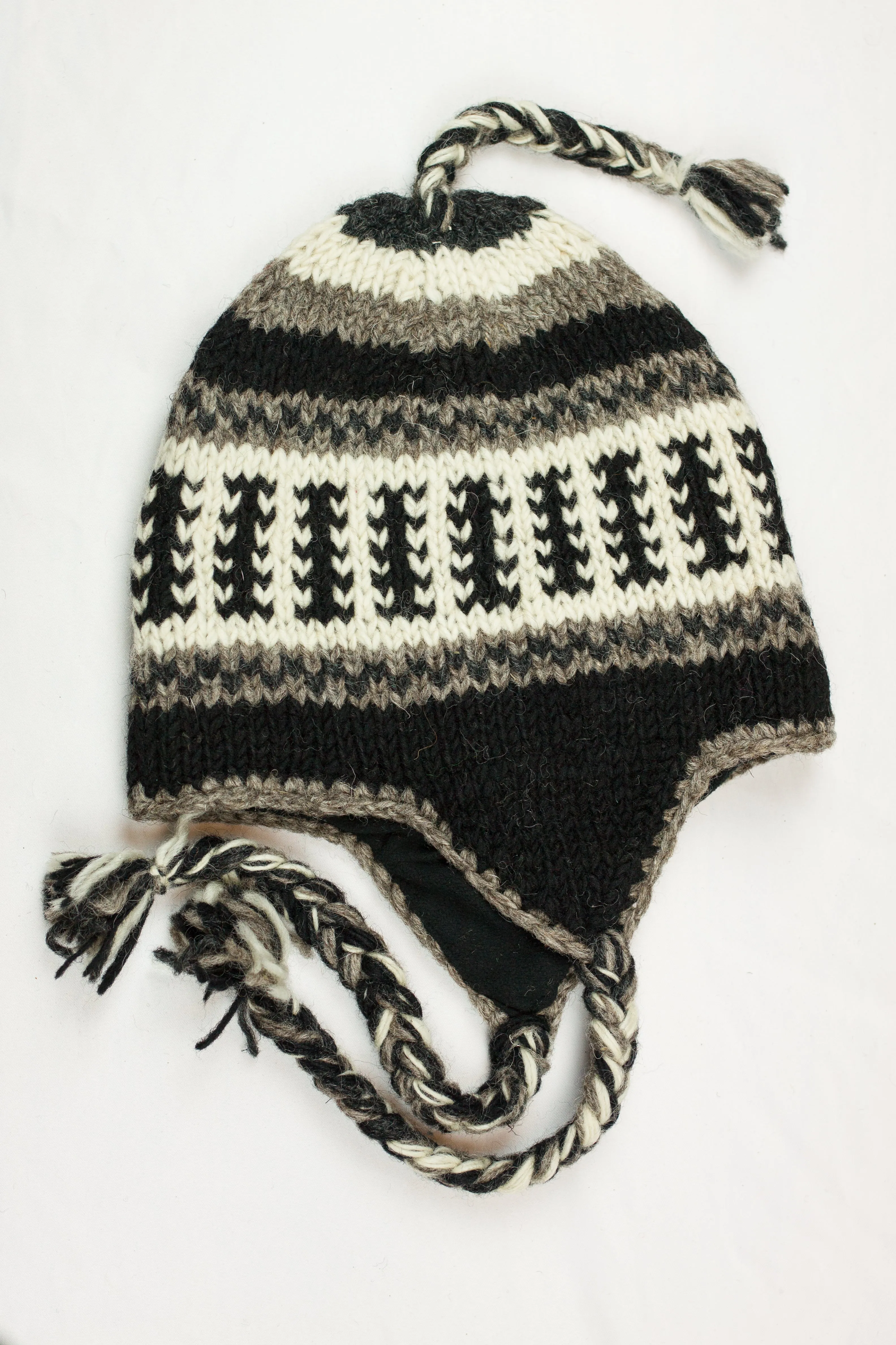 Hand knitted woolen Hat with soft fleece lining and ear flab - unisex