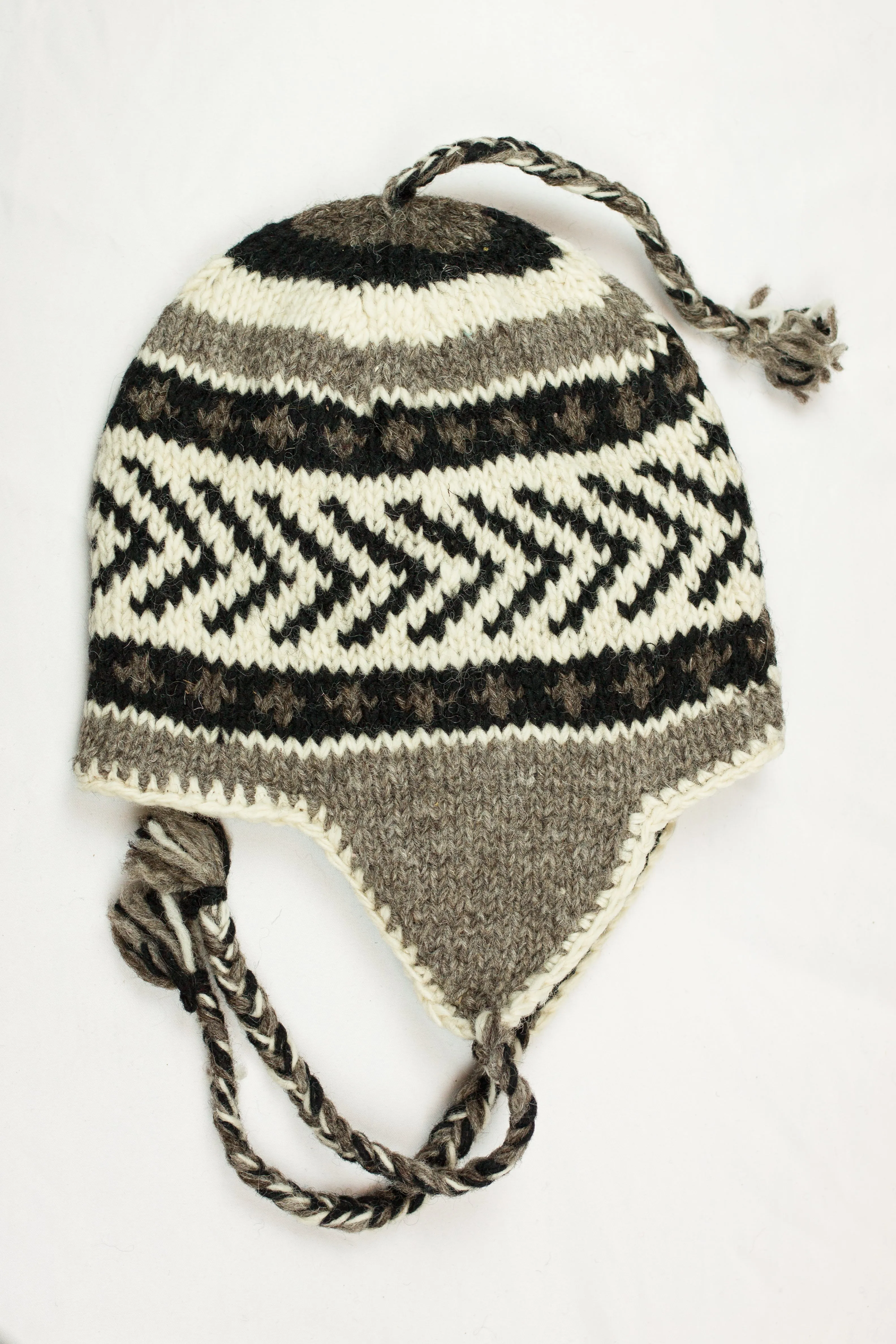 Hand knitted woolen Hat with soft fleece lining and ear flab - unisex