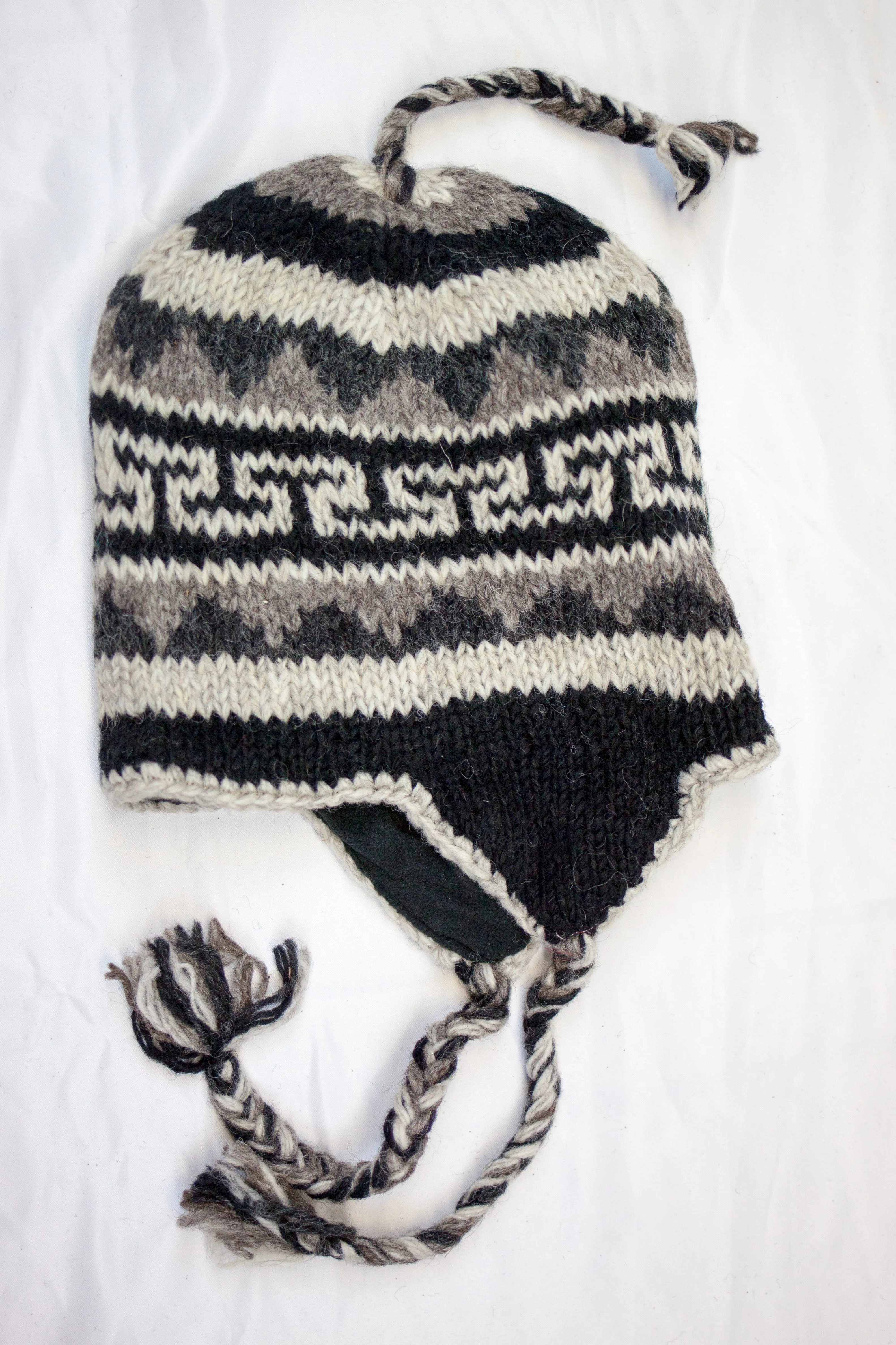 Hand knitted woolen Hat with soft fleece lining and ear flab - unisex