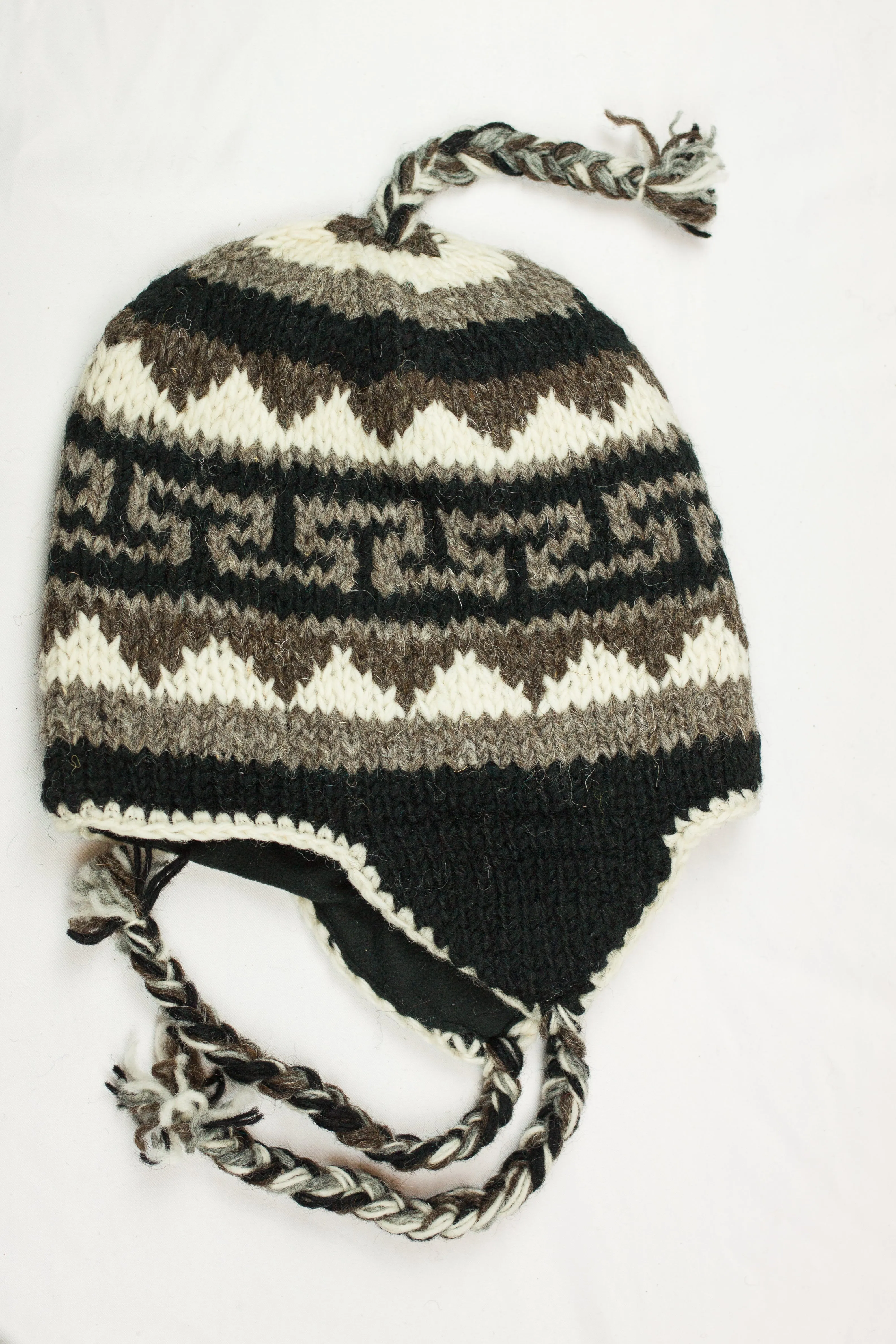 Hand knitted woolen Hat with soft fleece lining and ear flab - unisex