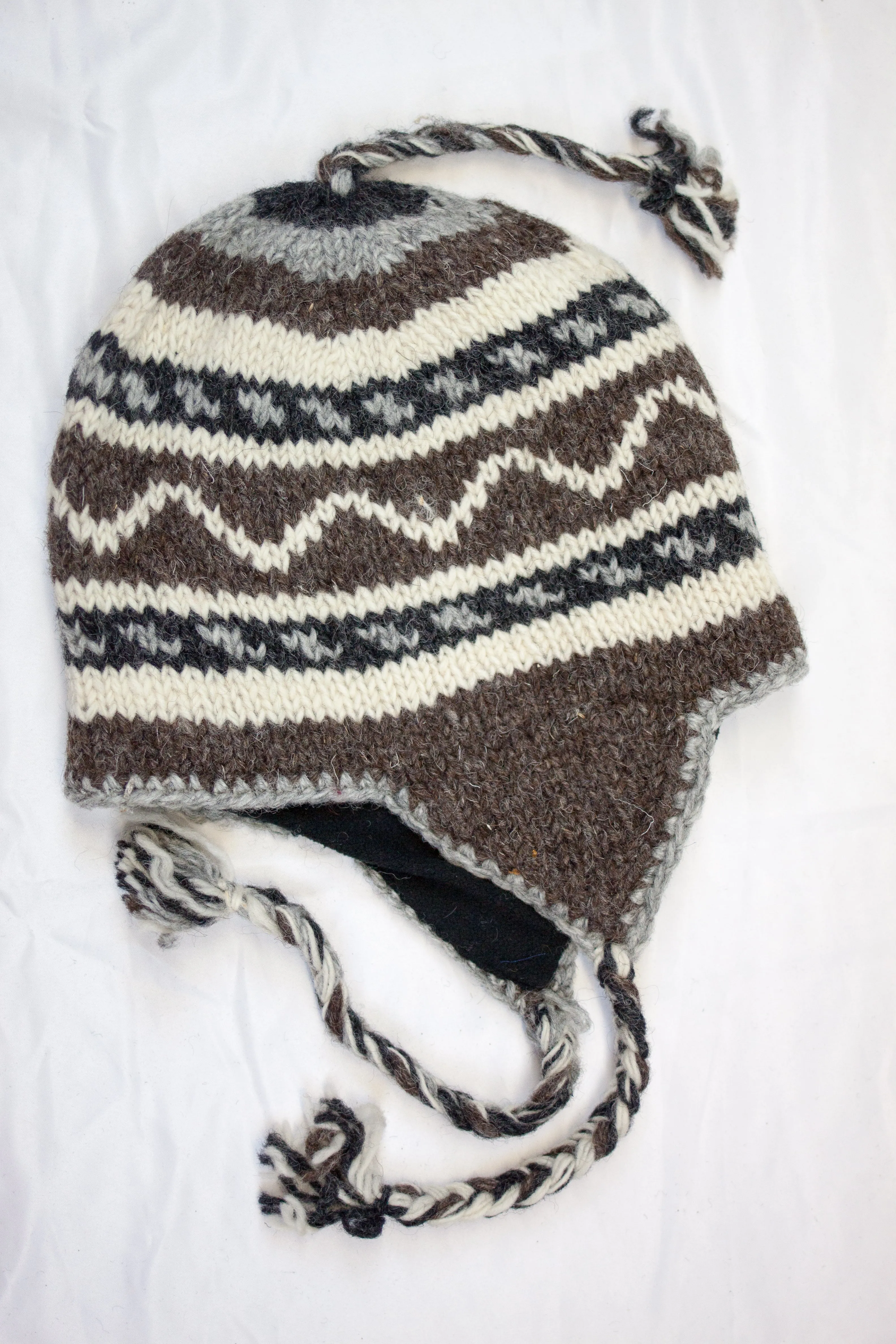 Hand knitted woolen Hat with soft fleece lining and ear flab - unisex