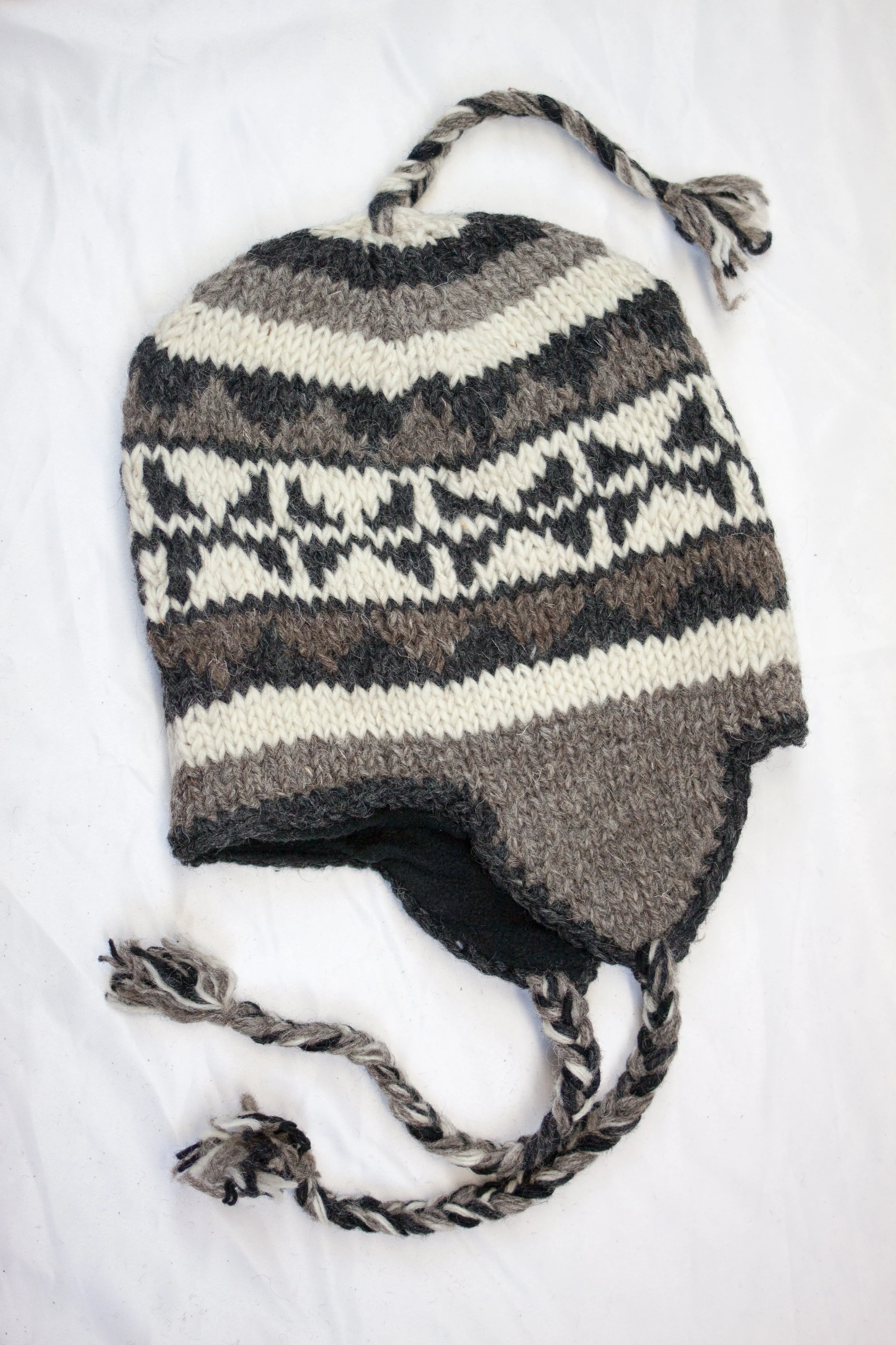 Hand knitted woolen Hat with soft fleece lining and ear flab - unisex