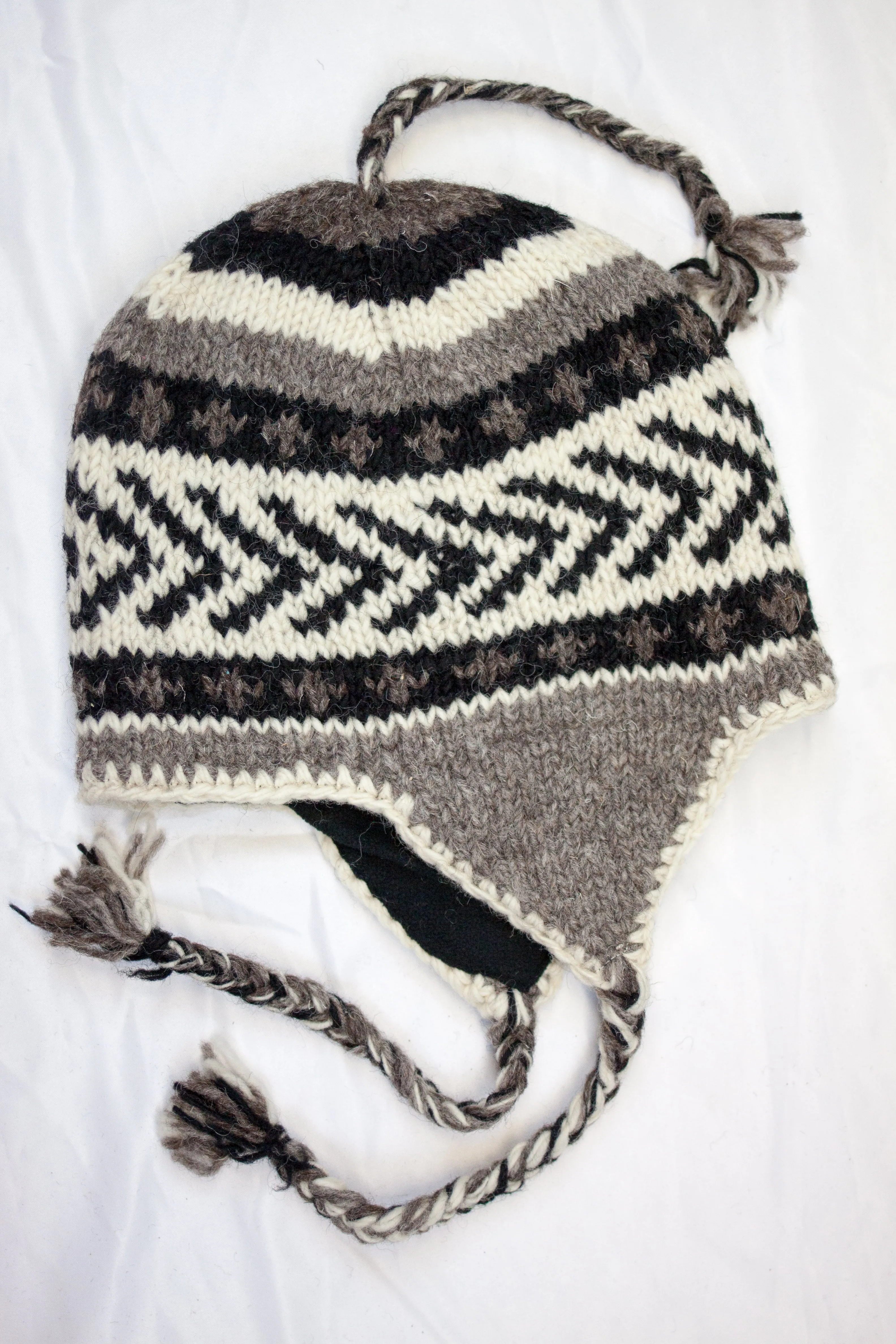 Hand knitted woolen Hat with soft fleece lining and ear flab - unisex