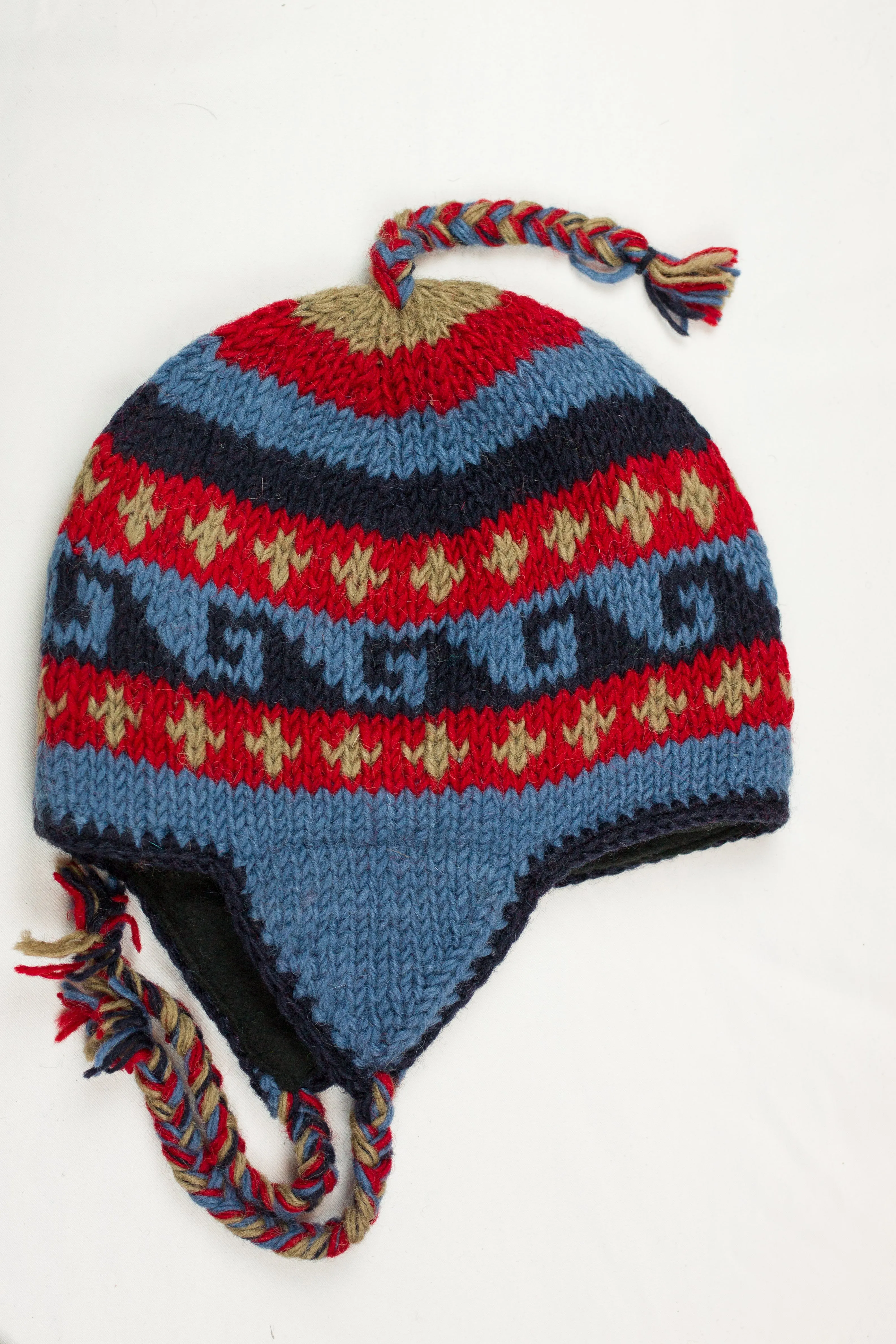Hand knitted woolen Hat with soft fleece lining and ear flab - unisex