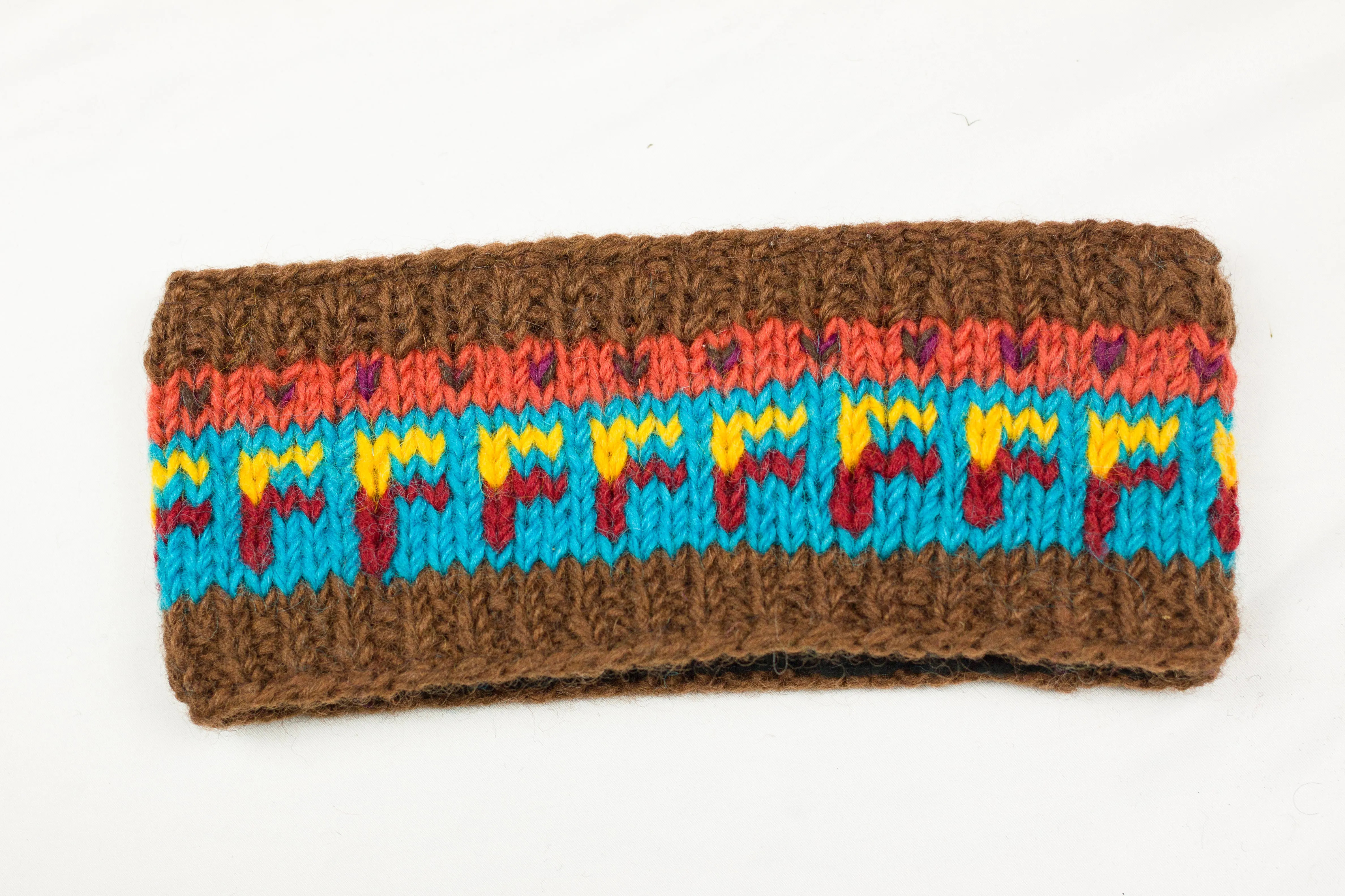Hand knitted woolen headband with soft fleece liner - unisex