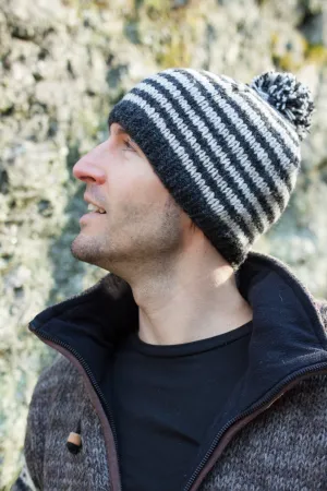 Hand knitted woolen pom pom beanie with soft fleece liner - unisex