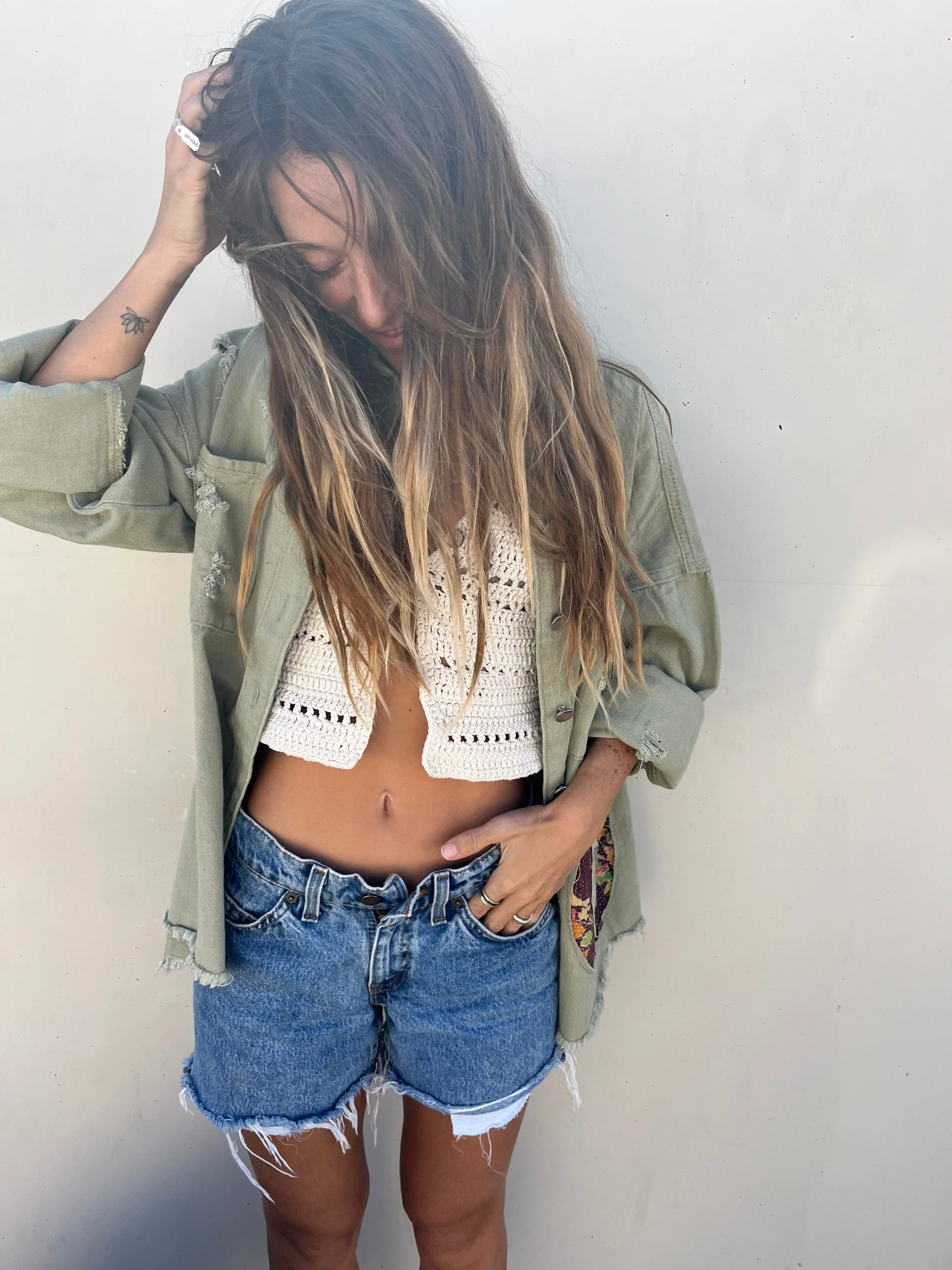She is a surfer green jacket