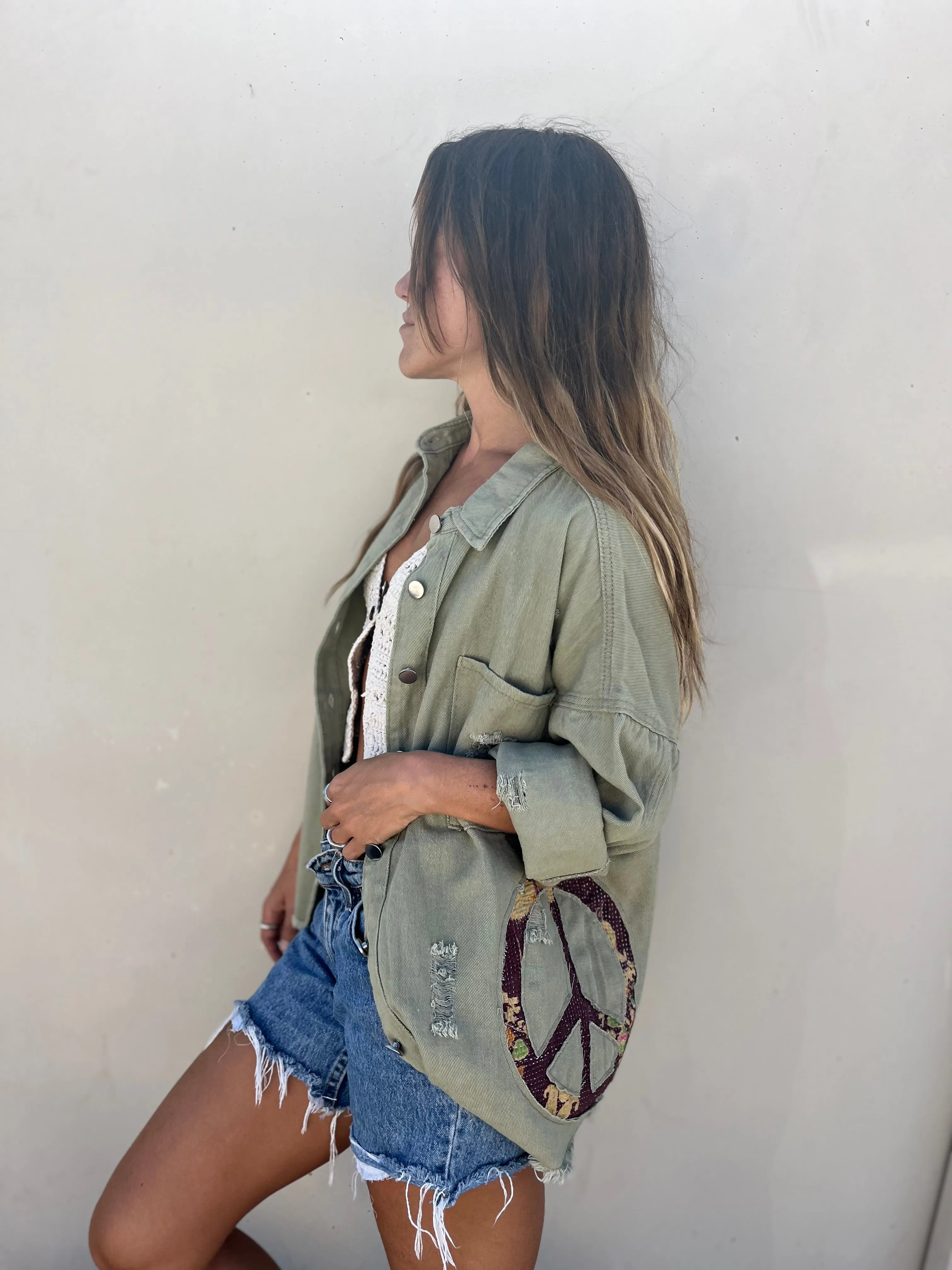 She is a surfer green jacket